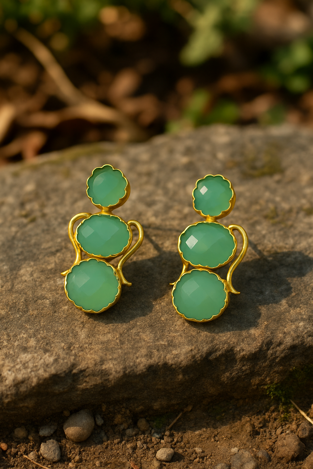 ELEGANT GOLD-TRIMMED AQUA STONE EARRINGS